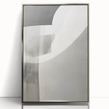 Framed abstract minimalist wall art showcasing a geometric design in silver and white, perfect for modern decor. Ideal for enhancing contemporary living spaces.