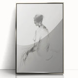 Framed abstract figurative artwork in silver acrylic, showcasing fluid shapes and modern design, perfect for enhancing contemporary interiors.