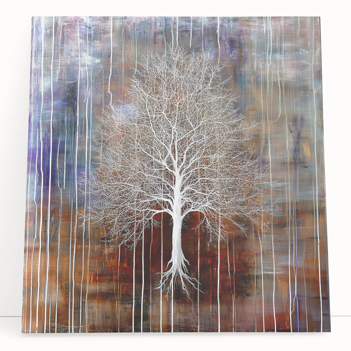 Abstract floral canvas artwork featuring vibrant colors and intricate designs, elegantly leaning against a neutral wall, ideal for modern home decor.
