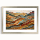 Textured abstract art print in warm autumn hues on a silver-framed canvas, suitable for bedroom decor.