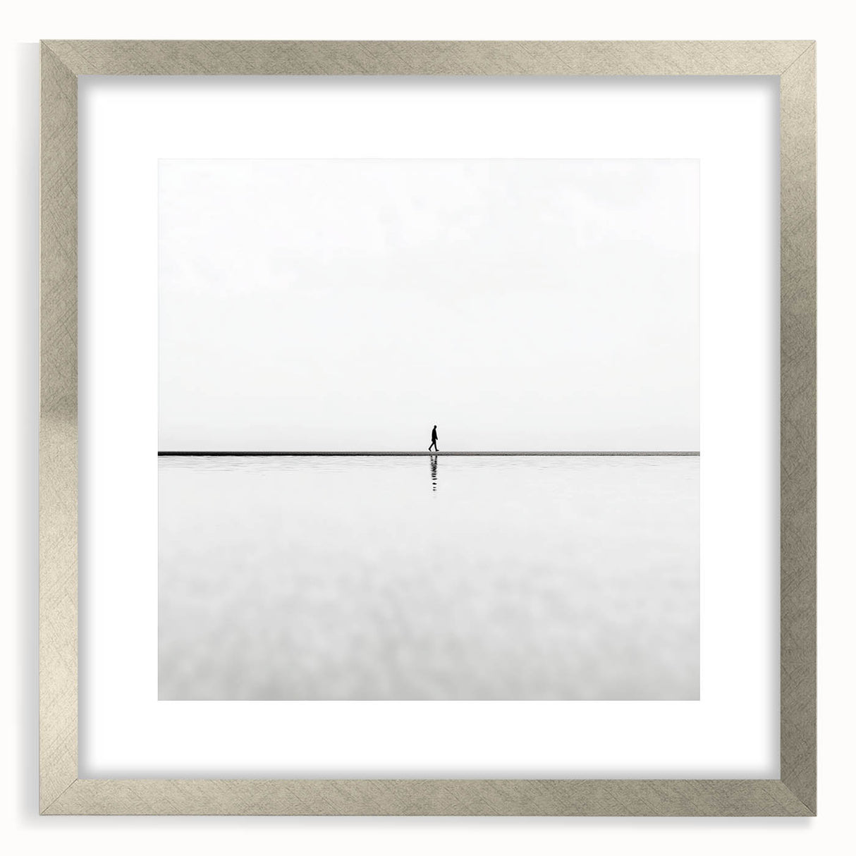 Abstract landscape artwork framed in silver, featuring a soft mat, showcasing tranquil hues of blue and green, ideal for modern home decor.
