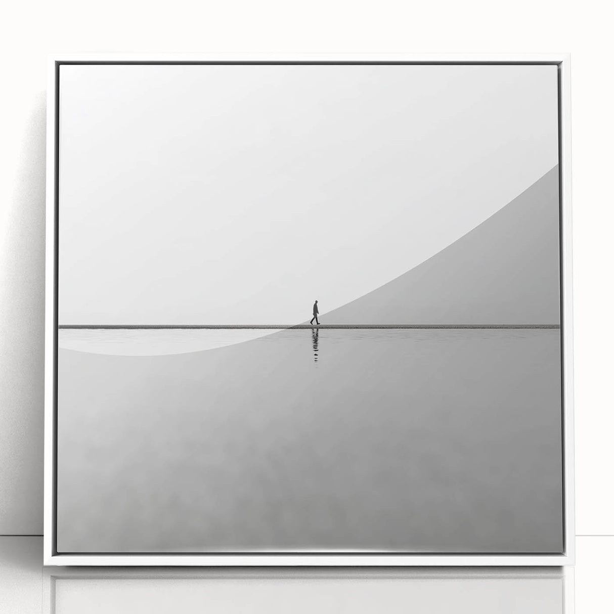 Framed acrylic artwork displaying an abstract landscape in soft hues of blue and white, perfect for modern home decor. Ideal for enhancing living spaces with contemporary style.