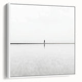 Framed canvas artwork depicting an abstract landscape in soft hues of blue and green, elegantly displayed from a white side view, perfect for modern home decor.