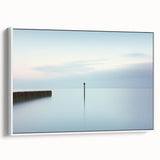 Framed abstract landscape canvas artwork displaying soft hues of blue, green, and white, showcasing a serene natural scene, ideal for modern home decor.
