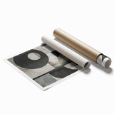 Abstract minimalist wall art print featuring soft pastel colors and geometric shapes, elegantly rolled and ready for display, perfect for modern home decor.