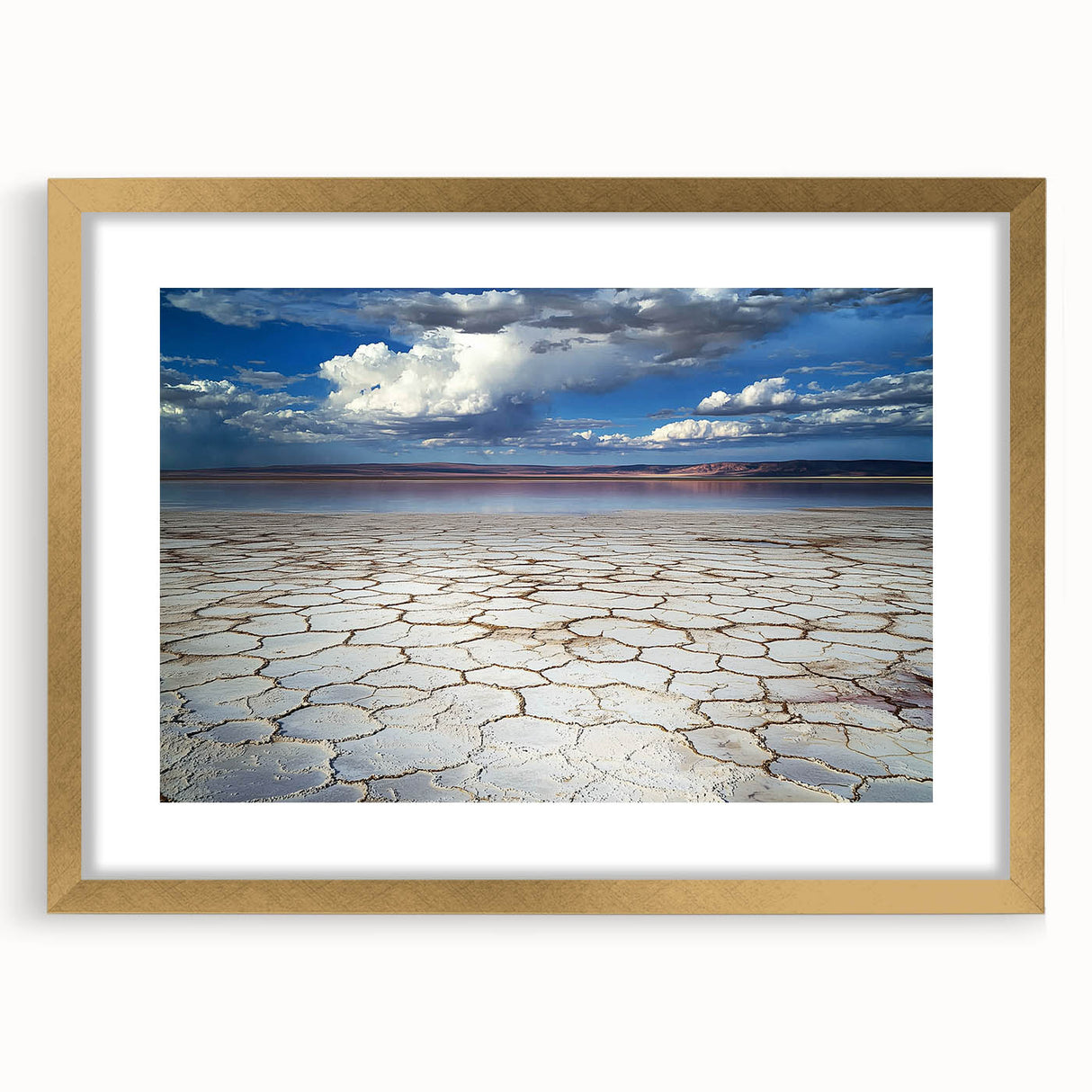 Abstract landscape artwork framed in gold with a white mat, showcasing soft pastel colors and fluid shapes, perfect for modern home decor.