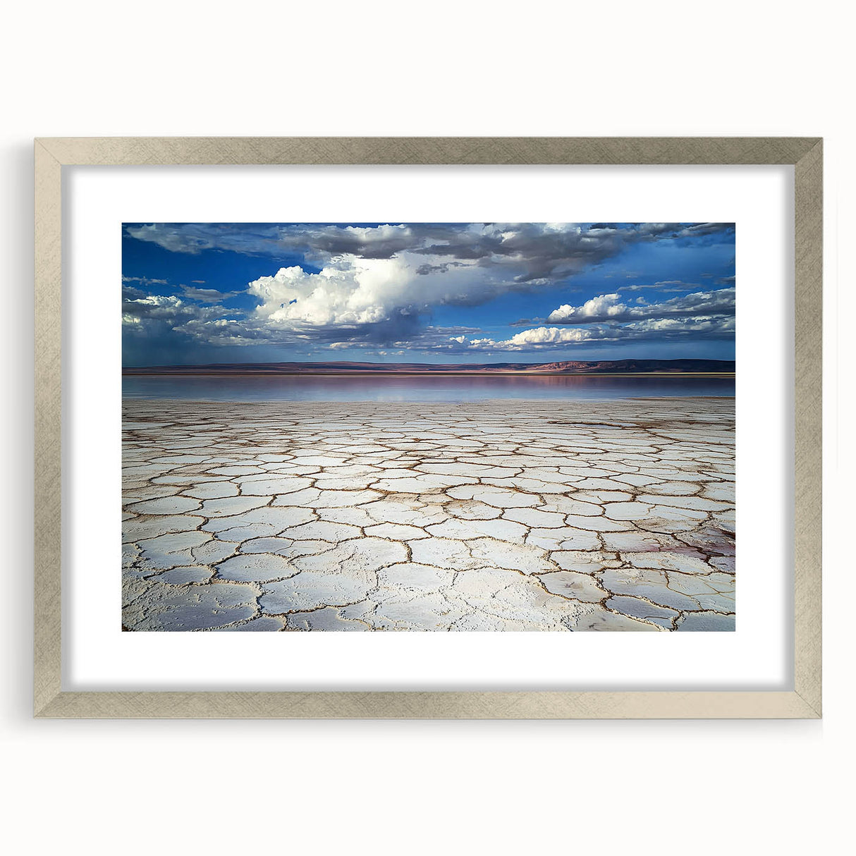 Contemporary abstract landscape artwork framed in an elegant silver mat, showcasing soft blues and earthy tones, perfect for modern decor.