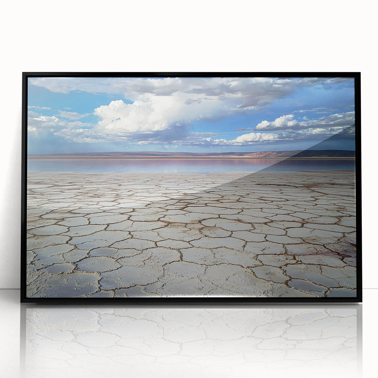 Framed acrylic artwork showcasing a vibrant abstract landscape with bold colors and intricate patterns, presented in a sleek black frame, ideal for modern decor.