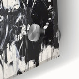 Vibrant abstract acrylic splatters on glass, showcasing a colorful array of blues, reds, and yellows, perfect for modern home decor and artistic displays.