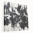Abstract canvas art showcasing vibrant splatters of color in a modern design, displayed in a side view to highlight its texture and depth. Perfect for contemporary home decor or art enthusiasts looking to enhance their living space with bold, expressive artwork.