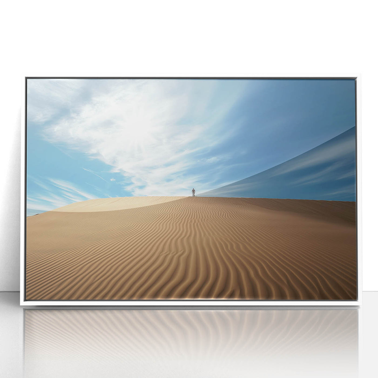 Framed acrylic artwork depicting a vibrant desert landscape with warm tones of orange and yellow, set against a sleek white frame, perfect for modern home decor.