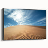 Framed canvas artwork depicting a serene desert landscape with vibrant colors and intricate details, presented with a sleek black frame, enhancing modern decor.