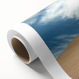 Desert landscape rolled canvas art showcasing vibrant hues of orange and gold, elegantly packaged in a protective tube, perfect for home decor enthusiasts.