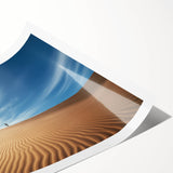 Desert landscape rolled canvas print showcasing vibrant orange and yellow hues with intricate details, packaged securely in a durable cardboard tube for easy transport.