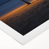 Close-up of a rolled canvas showcasing a stunning landscape of golden dunes under a blue sky, packaged securely in a durable cardboard tube for safe shipping. This artwork adds a warm, natural aesthetic to any space, perfect for nature lovers and home decor enthusiasts.
