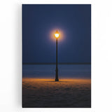 Stretched canvas artwork depicting serene sand dunes under a vibrant sunset, showcasing warm golden and orange hues, ideal for enhancing modern home decor.
