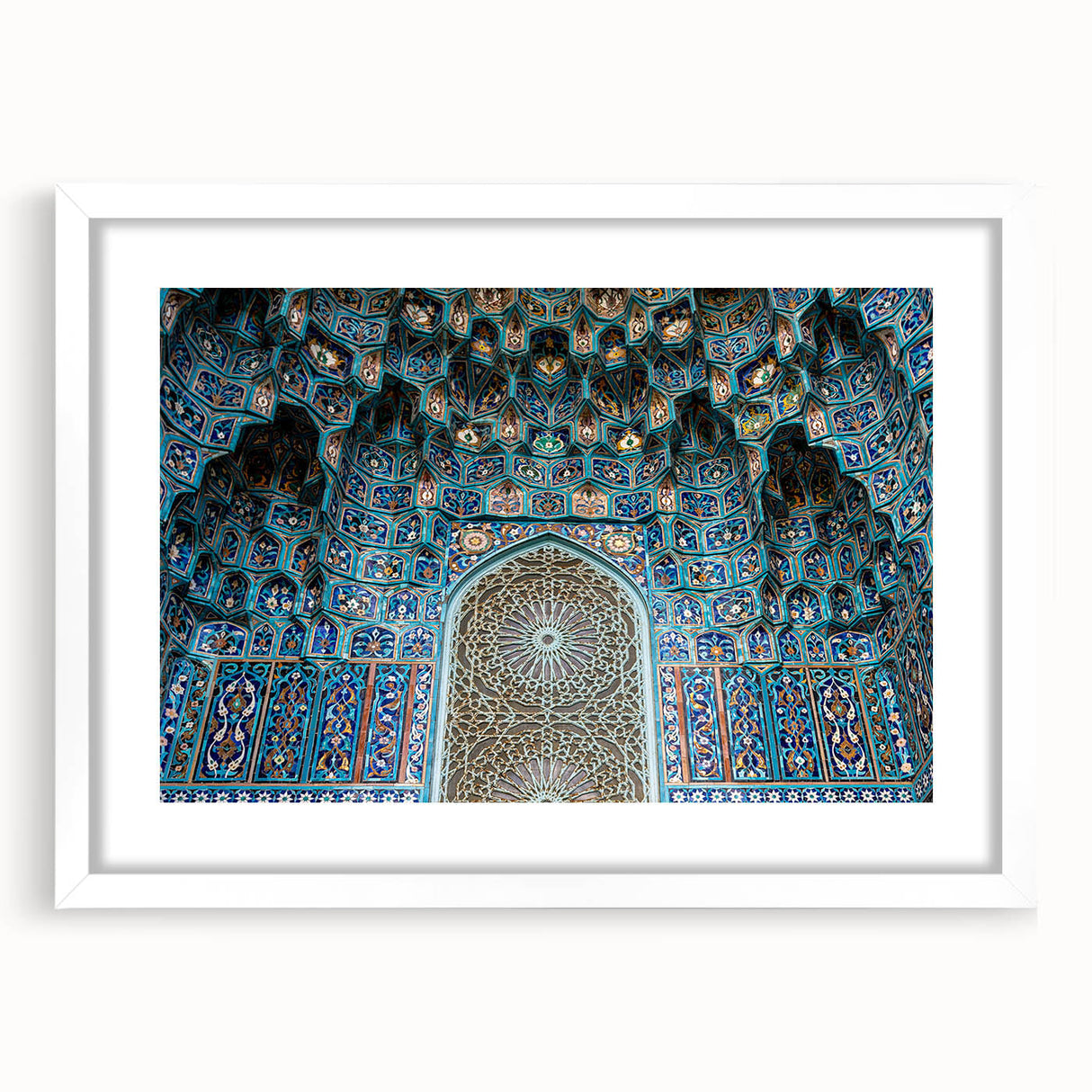 Extra large wall art featuring an abstract depiction of a Moroccan landscape in textured earth tones, framed in white.
