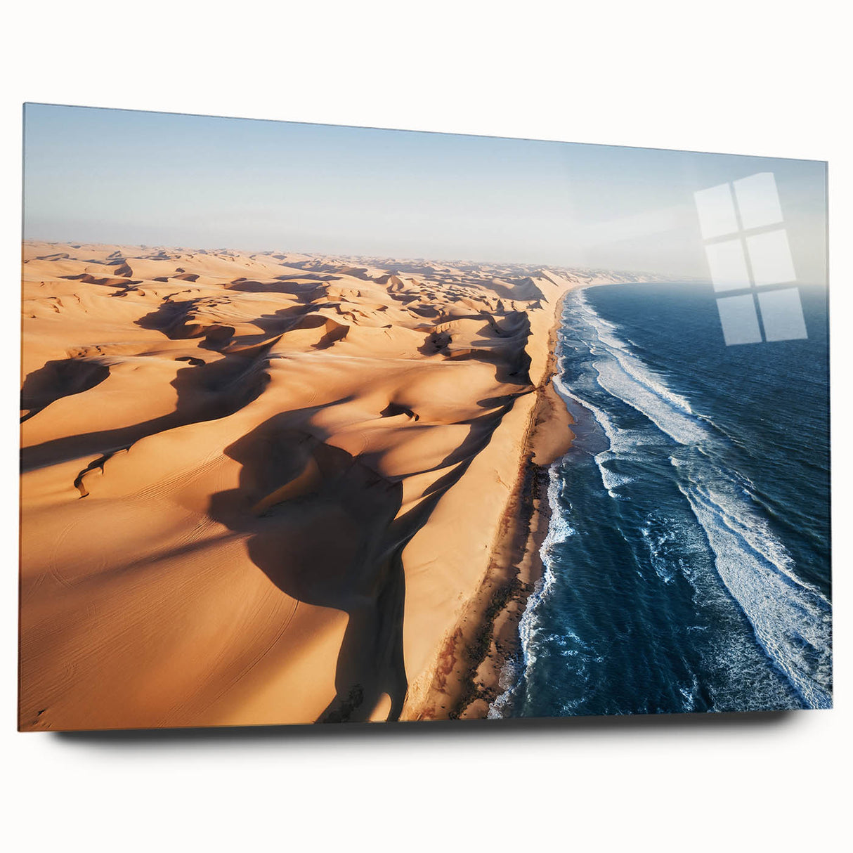 Large abstract wall art of a Namibian desert scene in amber tones on acrylic glass, ideal for bedroom or dining room decor.