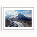Abstract art print of Yukon scenery in muted blue and green tones, framed with a white mat, ideal for dining room decor.