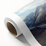 Art deco poster of Yukon scenery in muted green and blue tones on rolled canvas.