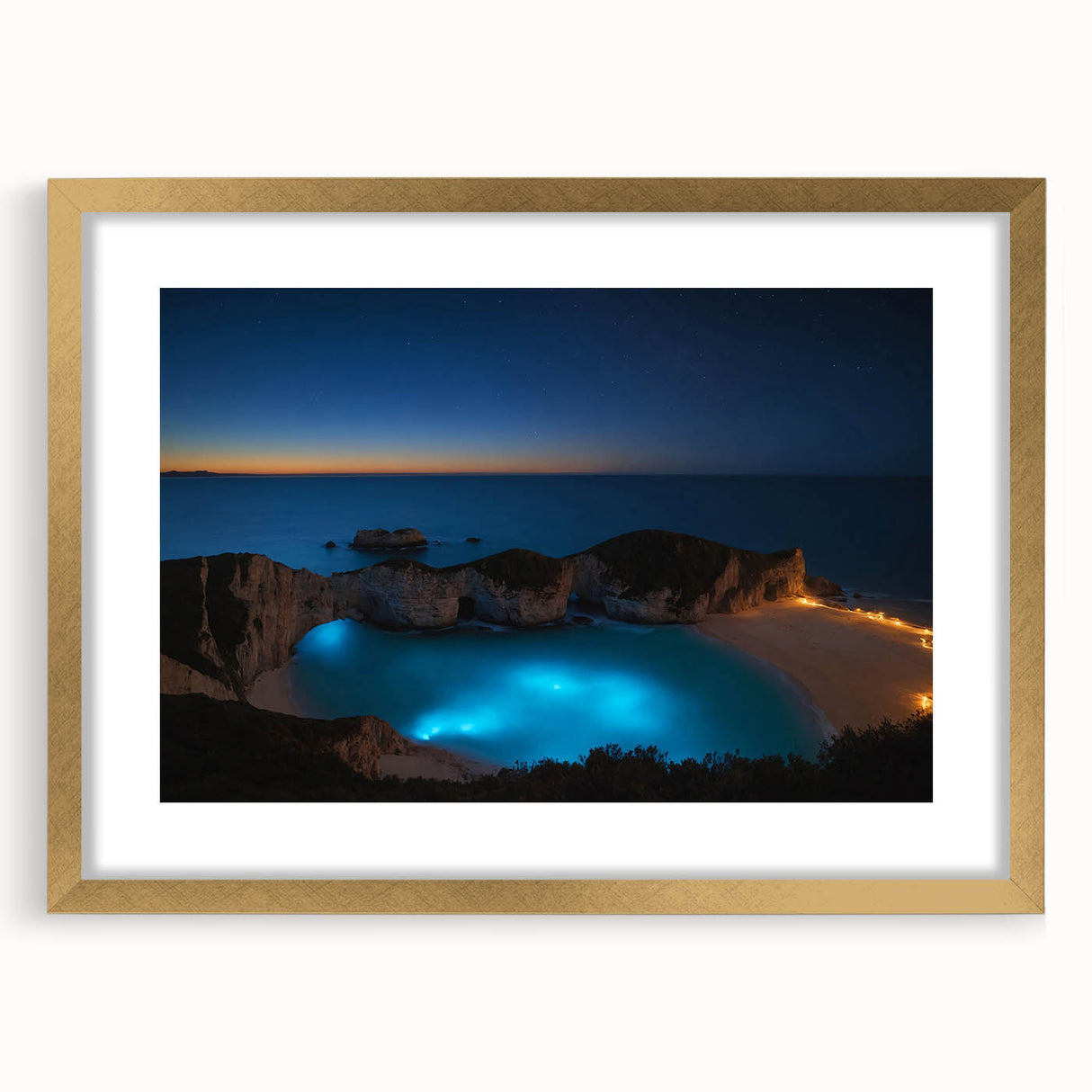 Abstract art print of a Caribbean scenery in gold frame with mat, featuring vibrant blue and green tones.
