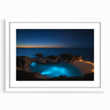 Textured abstract art print of a Caribbean scenery in muted blue and green tones on a framed white mat.