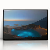 Large abstract wall art depicting a Caribbean scenery in vibrant blue and green tones, framed in black acrylic.