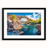 Extra large, textured abstract art print featuring vibrant hues of a European scenery on a framed black mat.