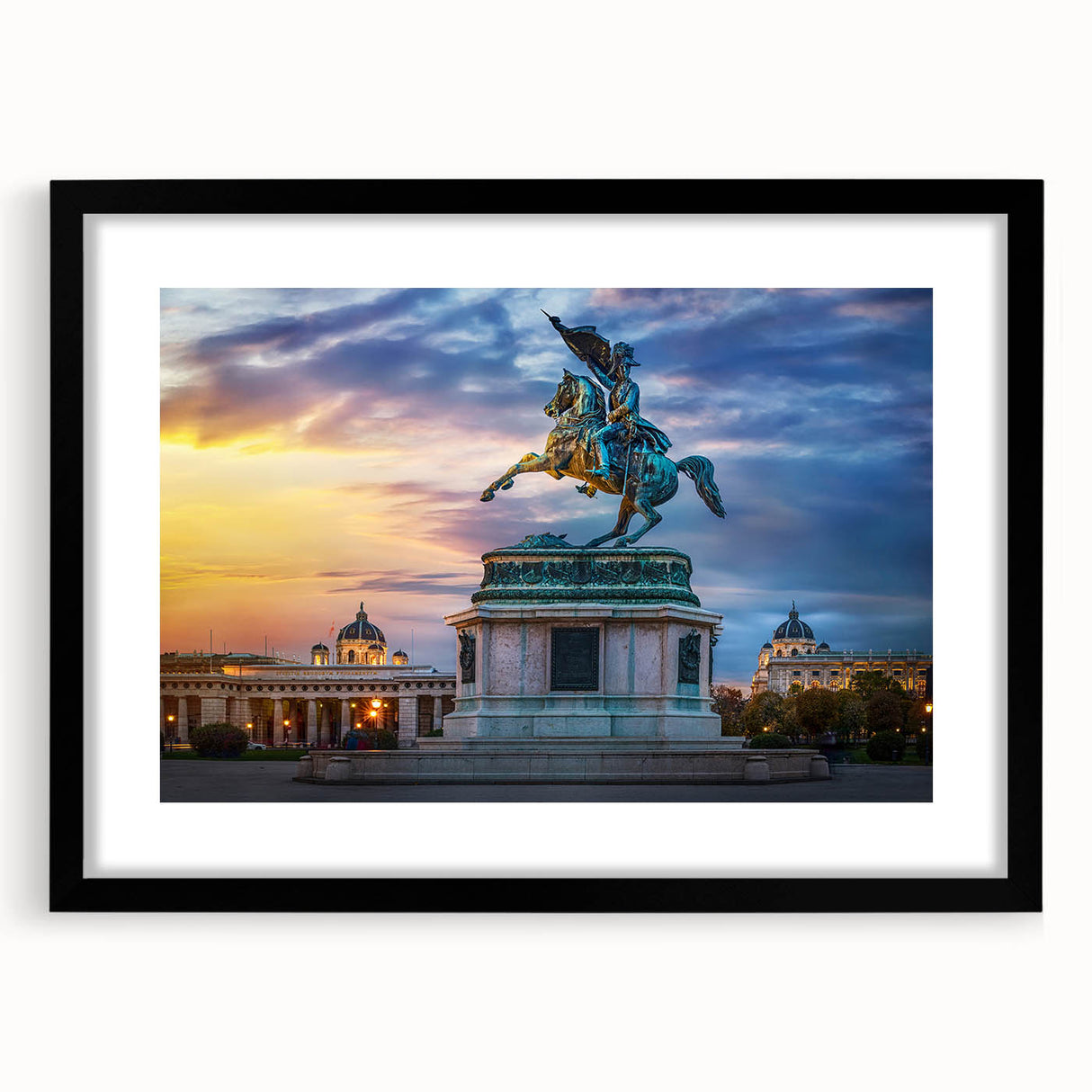 Abstract art print of a colorful European landscape in a black frame, ideal for living room decor.