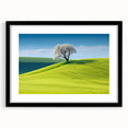 Abstract art print of a colorful European scenery in a black frame with mat, ideal for living room decor.