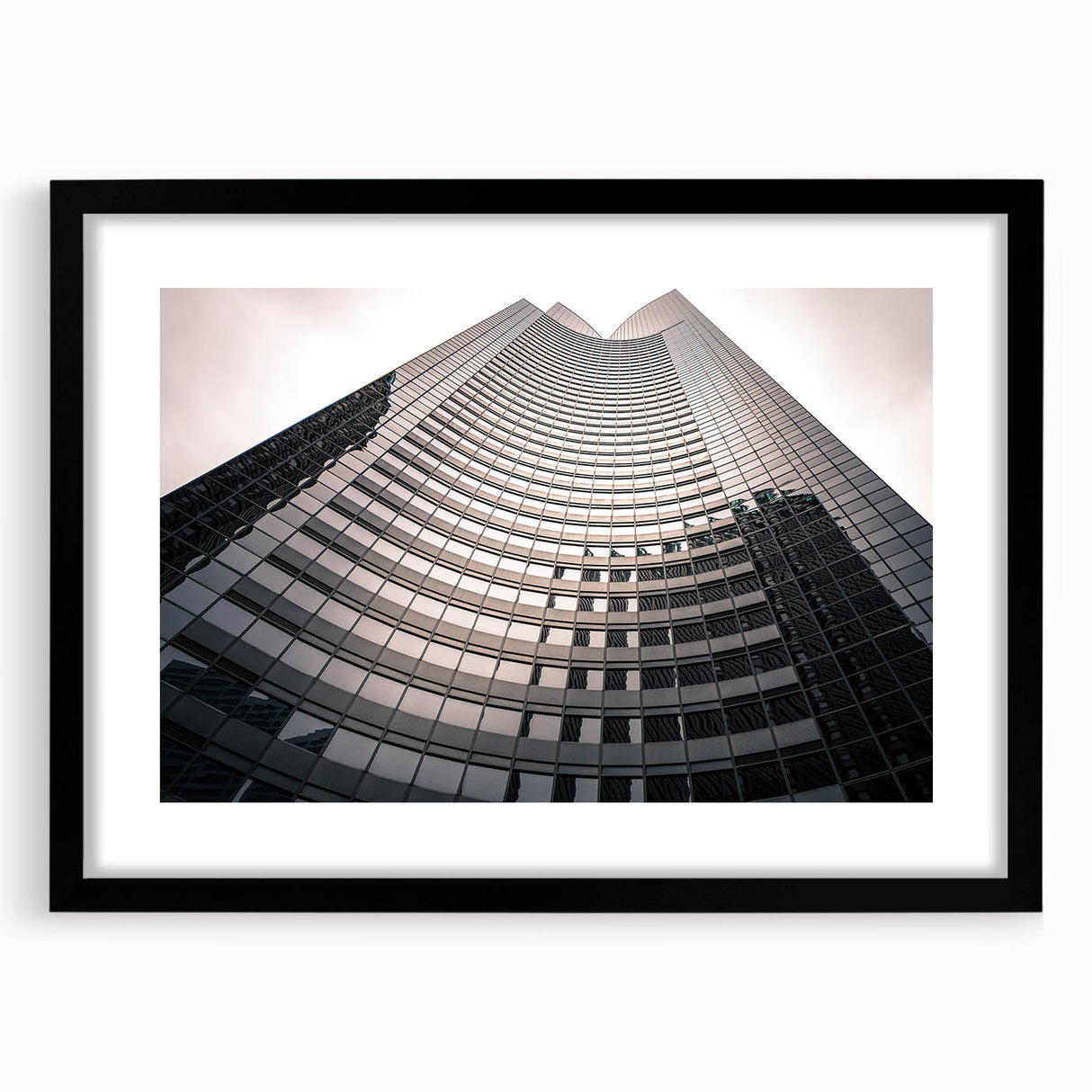 Extra large abstract art print of colorful, textured London scenery on a black-framed canvas, ideal for living room decor.