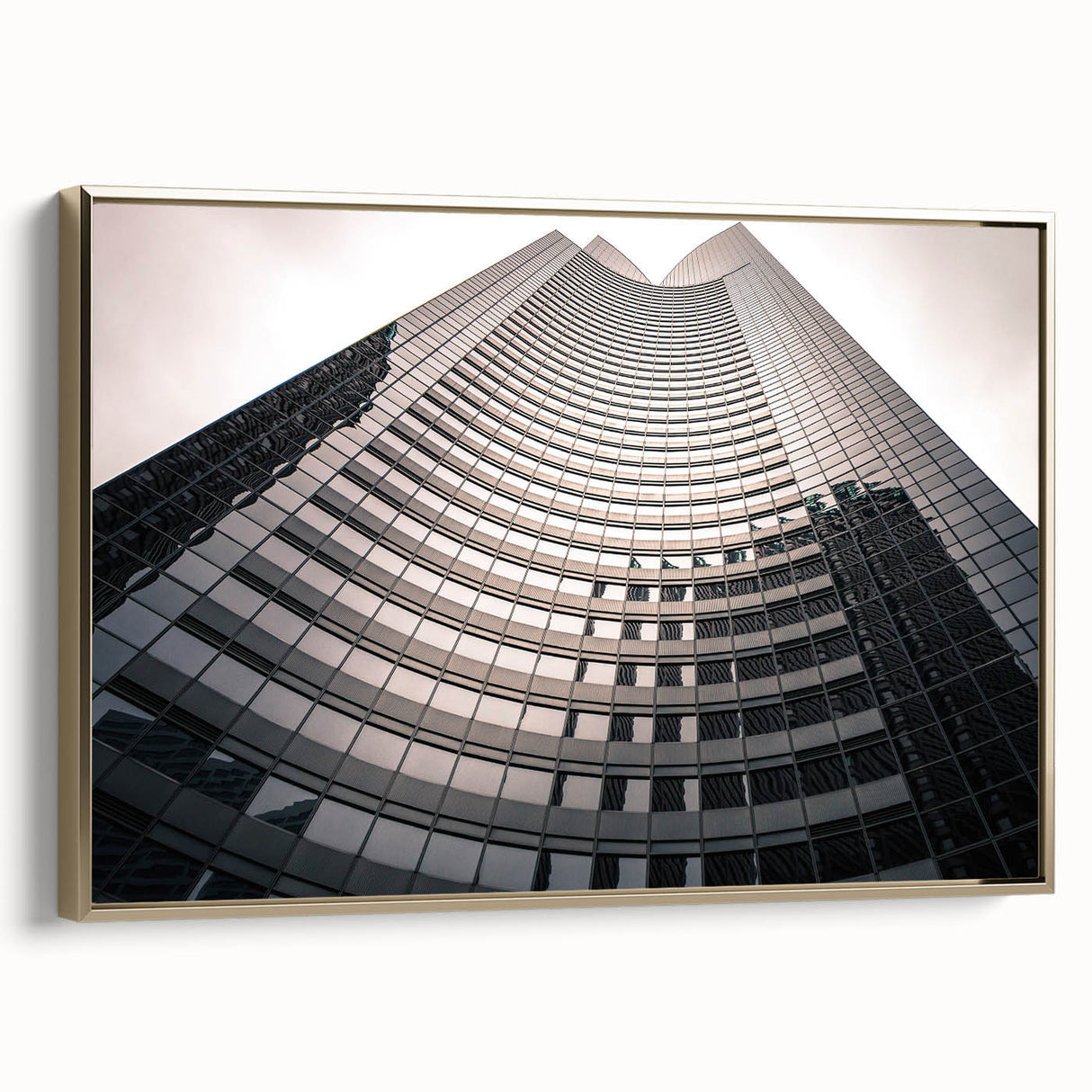 Framed canvas wall art depicting a vintage-style London landscape in muted gold and black tones, ideal for bedroom decor.