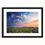 Extra large abstract art print featuring a colorful, textured depiction of a European scenery, framed in black.