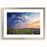 Extra large abstract art print of a textured European scenery in muted earth tones, framed in silver.