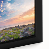 Extra large framed canvas featuring a textured depiction of a European scenery in black with colorful accents.