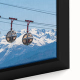 Black wall art featuring a textured painting of the French Alps in vibrant, colorful hues on a framed canvas.