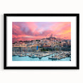 Colorful abstract art print of a Provence scenery in vibrant hues on a large textured canvas, framed in black.