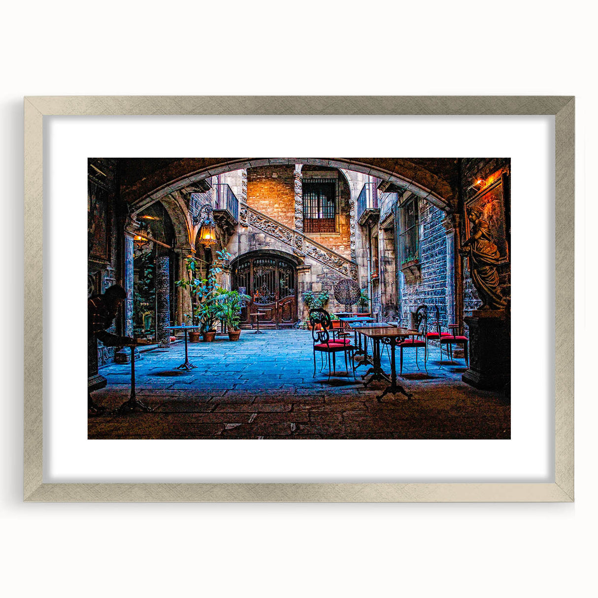 Extra large abstract art print of Barcelona scenery in silver frame, featuring textured strokes in muted earth tones.