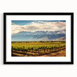 Colorful abstract art print of a textured Argentine landscape in a large black frame, ideal for living room decor.
