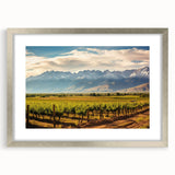 Textured abstract art print of a South American scenery in muted earth tones, framed in silver, ideal for bedroom art.