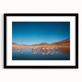 Extra large colorful art depicting abstract Bolivian scenery in vibrant hues on a textured canvas, framed in black.
