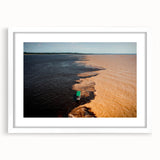 Abstract art print of a stylized Brazilian landscape in vibrant colors on a framed white mat.