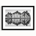 Abstract art print featuring textured, colorful scenery of Alaska on a large black-framed canvas.
