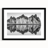 Abstract art print featuring textured, colorful scenery of Alaska on a large black-framed canvas.
