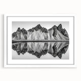 Abstract art print of Alaskan scenery in muted earth tones on a white-framed canvas.