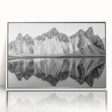 Acrylic print of a serene Alaska landscape in muted blue and white tones, framed in white.