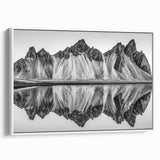 Vintage poster art of an Alaskan landscape on a large framed canvas, featuring vibrant colors against a black background.