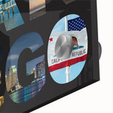 Large abstract wall art of San Diego scenery in muted blue and orange tones on acrylic glass, suitable for dining room decor.