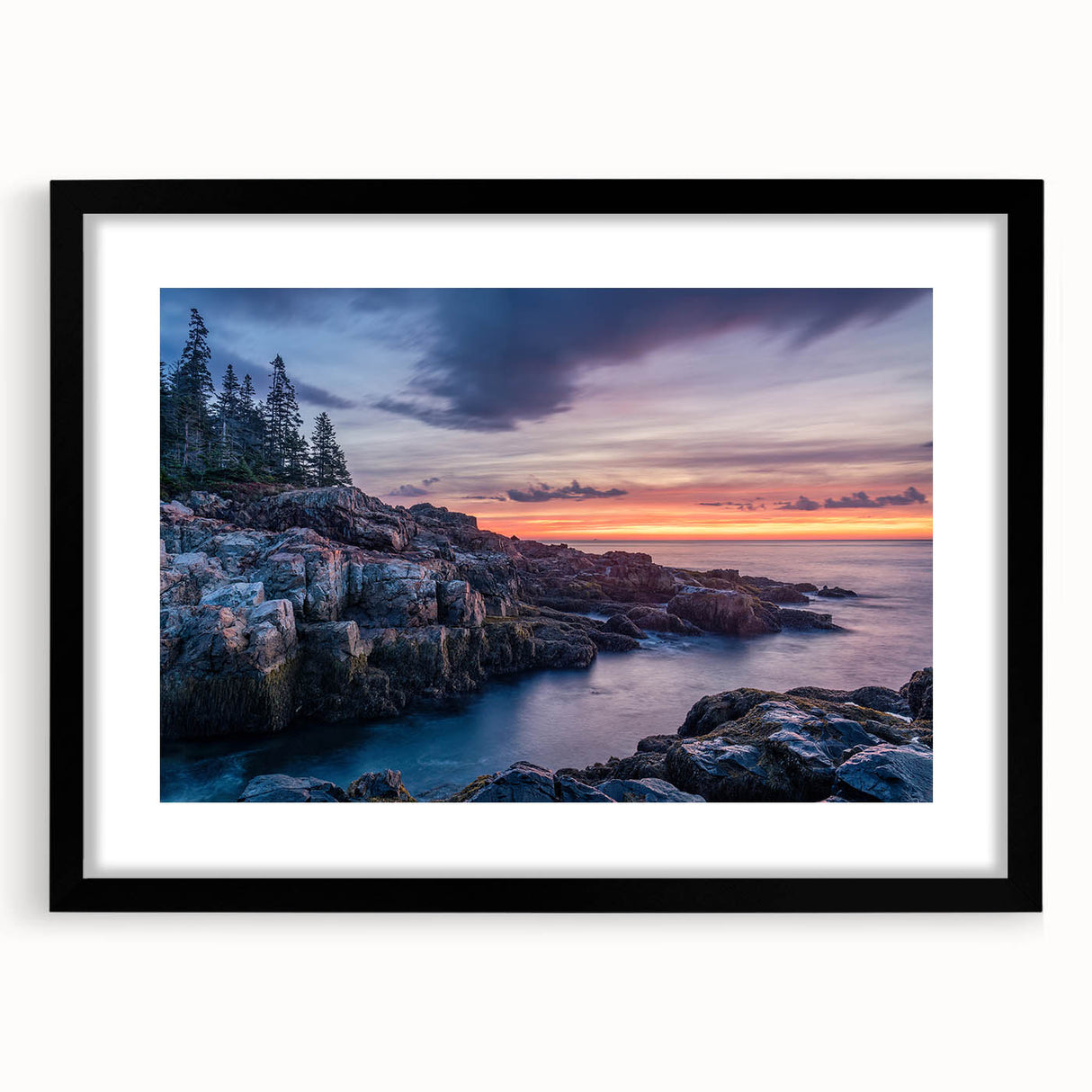 Colorful abstract art print of Acadia, Maine, in a black frame with mat, featuring vibrant, textured hues.
