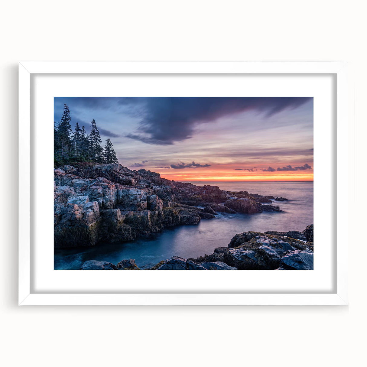 Abstract art print of Acadia, Maine, in muted blue and green tones, framed with a white mat, ideal for dining room decor.